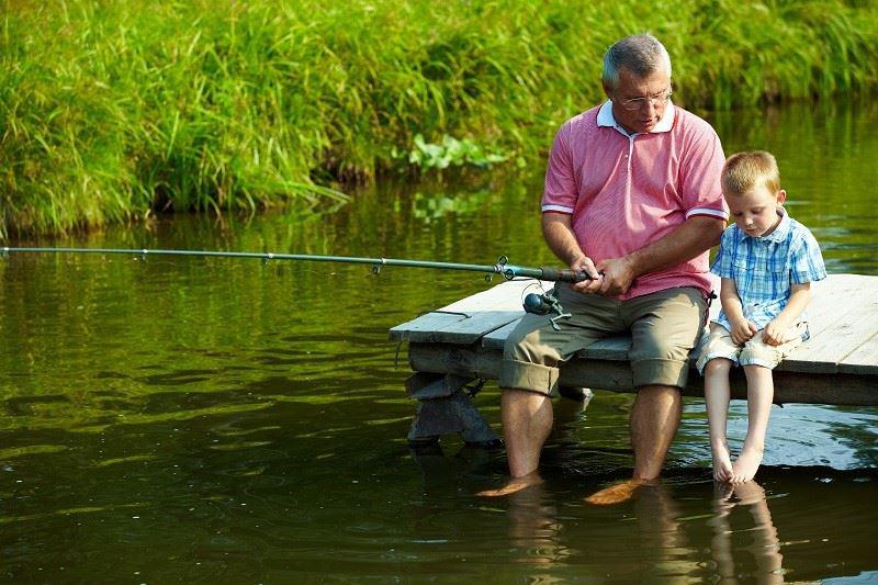 Man and child fishing in Blaine, MN