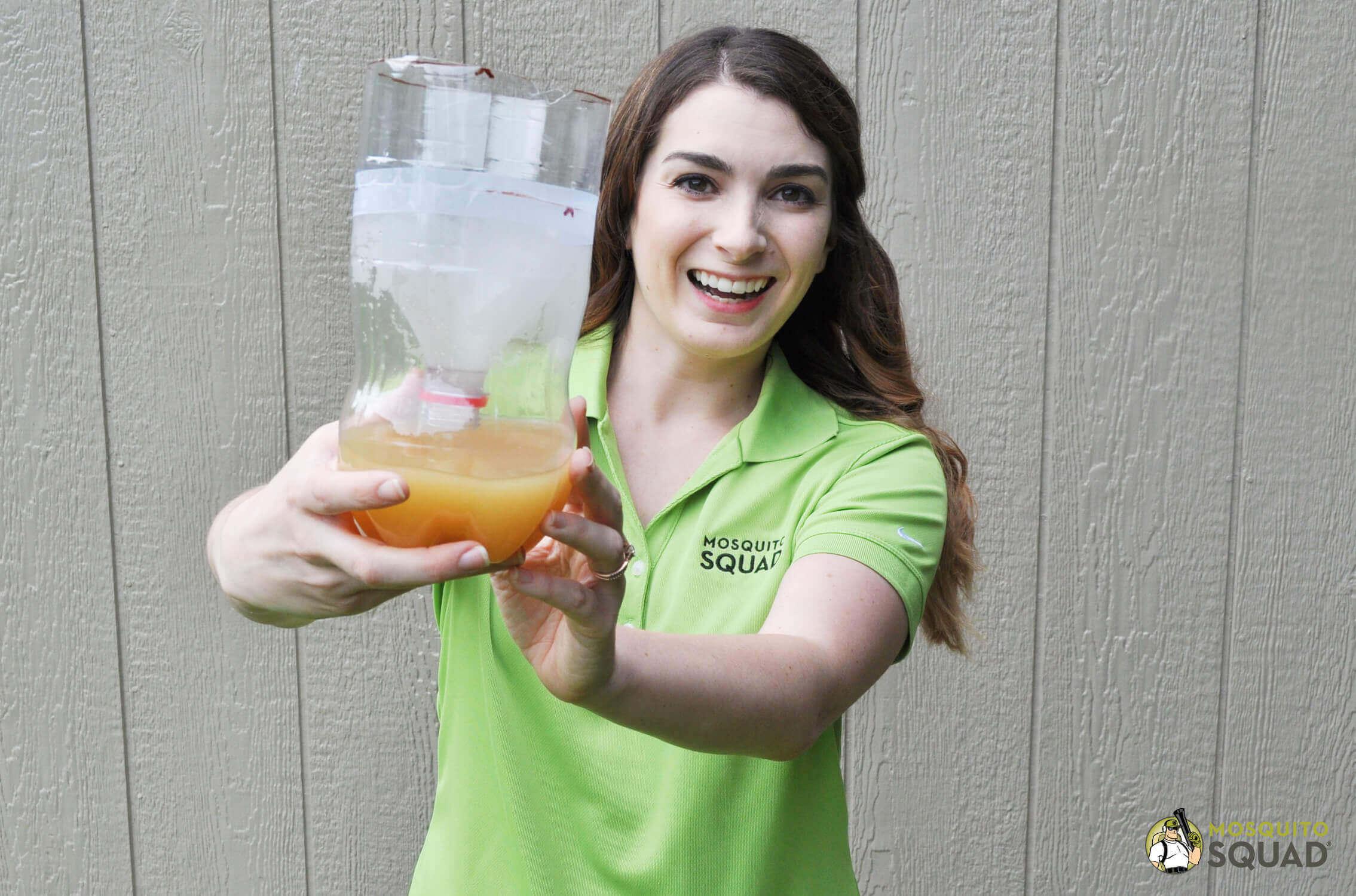 a mosquito control expert holding the DIY mosquito trap