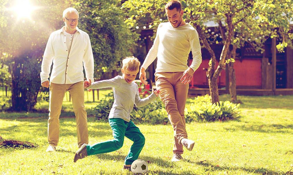 family playing soccer