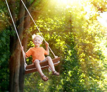 kid on swing