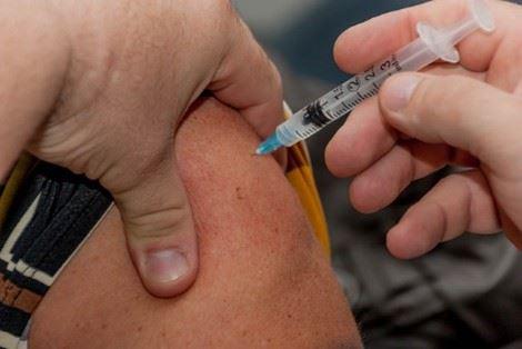 person receiving vaccine shot