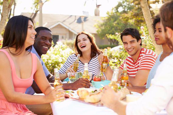 Group of friends enjoying an outdoor picnic